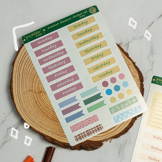 A sheet of colorful planner sticker labeled 'Summer Planner sticker set' displayed on a rustic wood slice coaster over a light marble surface.