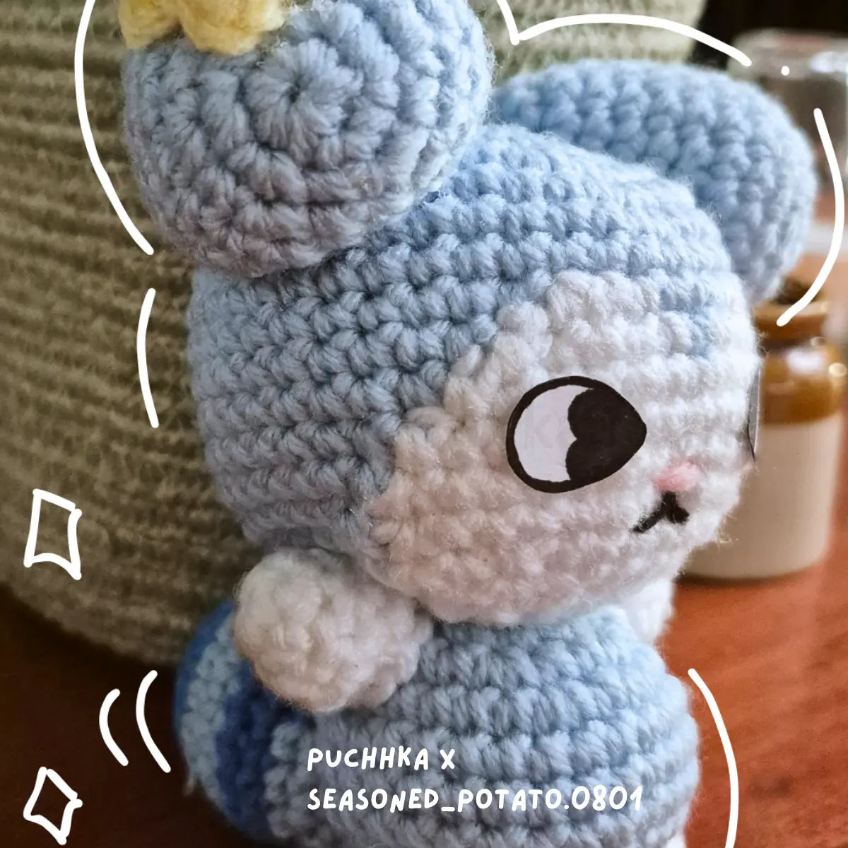 A close-up of a crocheted plush Tasy resembling, with visible text overlay reading 'PUCHKA X SEASONED_POTATO.0801'.