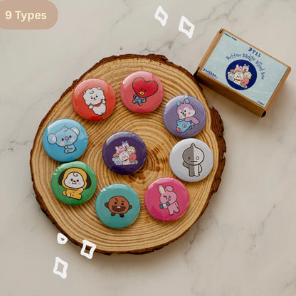 Nine round BT21 pinback buttons displayed on a round wood coaster, with a small branded box at the top right. The buttons feature colorful BTS's BT21 characters and include a variety of hues, making the product color identity best classified as Multicolor.
