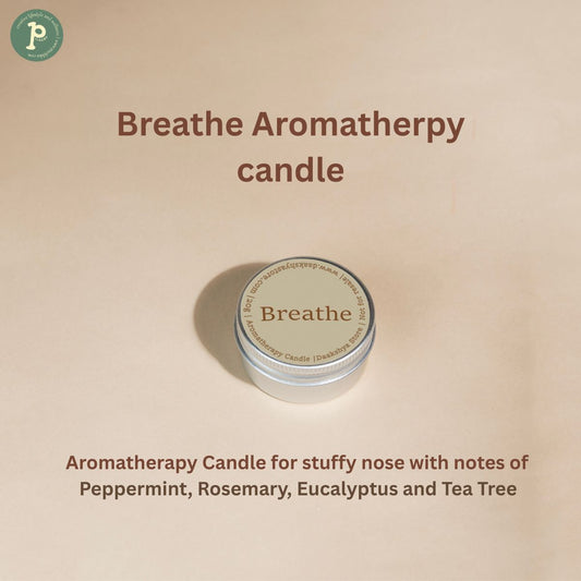 Breathe Aromatherapy mini candle 20g is kept on a beige background with scent notes "Peppermint, Rosemary, Eucalyptus and Tea Tree" at the bottom.
