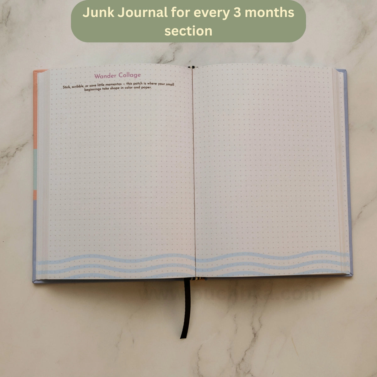 An open grid journal with blank pages, shown on a light marble surface. A green text bubble at the top reads 'Junk Journal for every 3 months section'.
