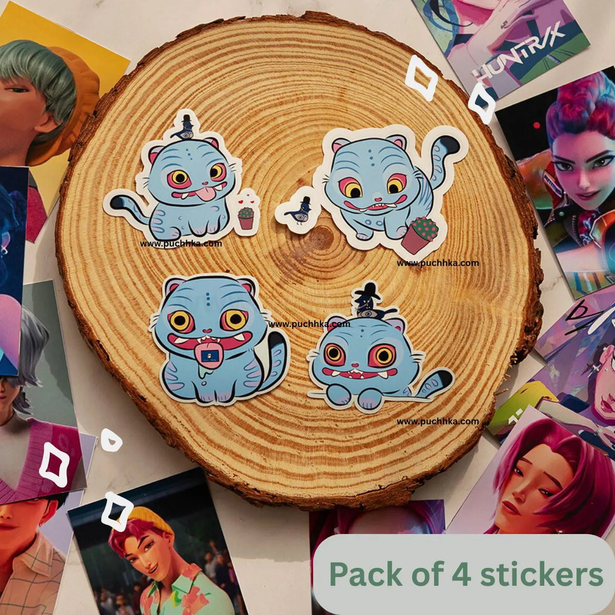 Four cute derpy tiger and pigeon stickers, arranged on a round wood slice with scattered character posters around it. A label at the bottom reads 'Pack of 4 stickers'.
