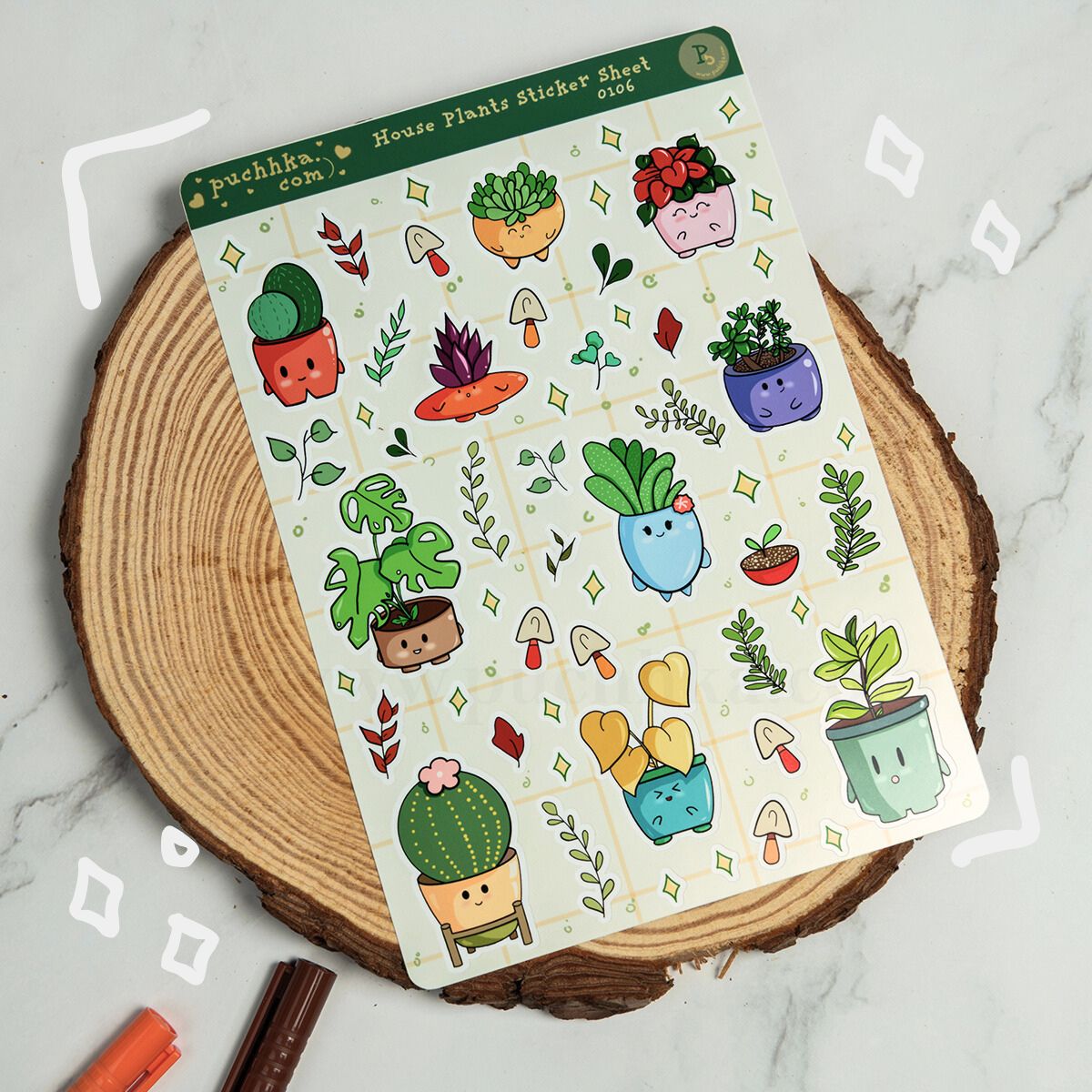 A sticker sheet titled 'puchka.com House Plants Sticker Sheet' featuring cute cartoon plant pots and small gardening motifs, placed on a round wood slice over a light marble surface.