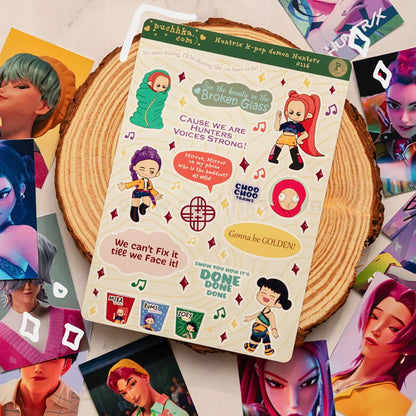 A sticker sheet from Puchhka featuring characters and quotes from the movie 'K-pop Demon Hunters', styled on a rustic wood slice with scattered character art cards around it.