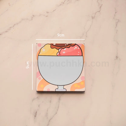 A square coaster featuring a cute illustration of a sundae in a glass bowl, shown on a light marble background with white dimension lines indicating a 9cm by 9cm size.