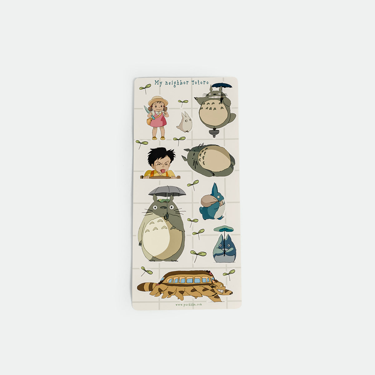 A vertical rectangular sticker sheet featuring characters and scenes from My Neighbor Totoro on a light cream background. The sheet includes illustrations of Totoro, the Catbus, with the title 'My neighbour Totoro' at the top.