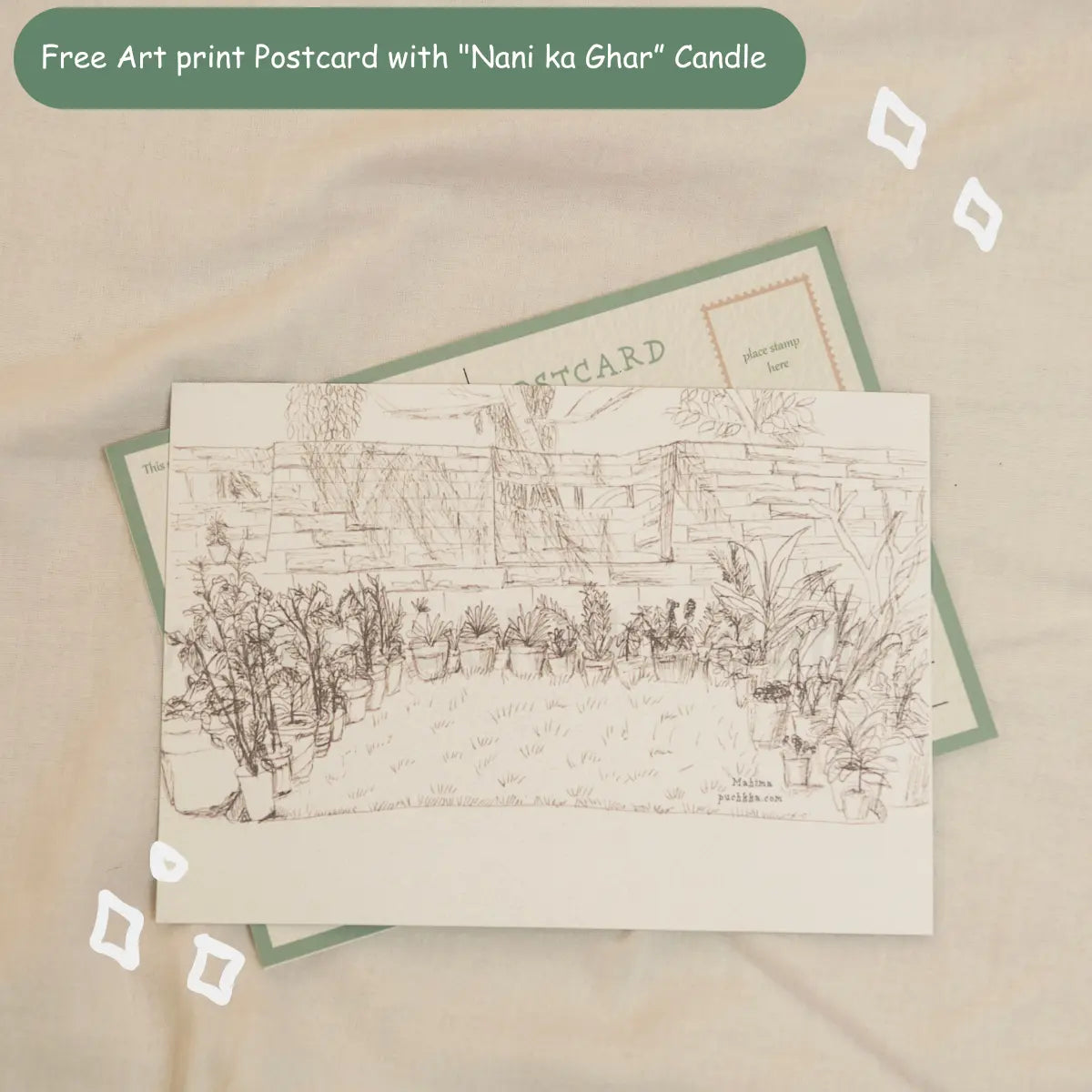 A postcard-style candle insert with a hand-drawn sketch of a garden scene, layered over a green postcard on a beige fabric background. Text at the top reads 'Free Art print Postcard with "Nani ka Ghar" Candle'.