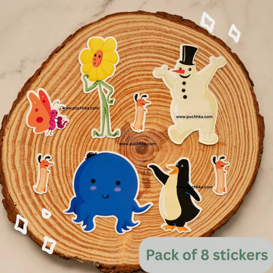 A pack of Oswald Characters stickers displayed on a round wood slice background. The stickers include a yellow flower with a smiling face, a blue octopus, a penguin, a snowman, a butterfly, and several small stick-figure-like characters.