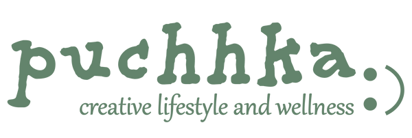 A green logo on a white background reading 'puchhka:' with smaller text 'creative lifestyle and wellness' and a semicolon symbol.