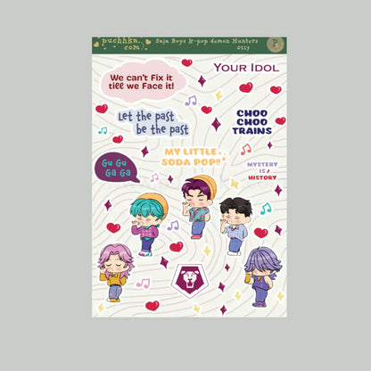 A rectangular sticker sheet featuring colorful cartoon boy group characters, musical notes, hearts, and text such as 'Your Idol,' 'Choo Choo Trains,' and 'Let the past be the past,' shown on a light gray background.