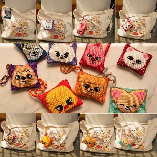 A collage showing multiple small cross-stitch style bag hangings with skzoo faces in different colors, plus several cream canvas tote bags featuring a skzoo illustration. 