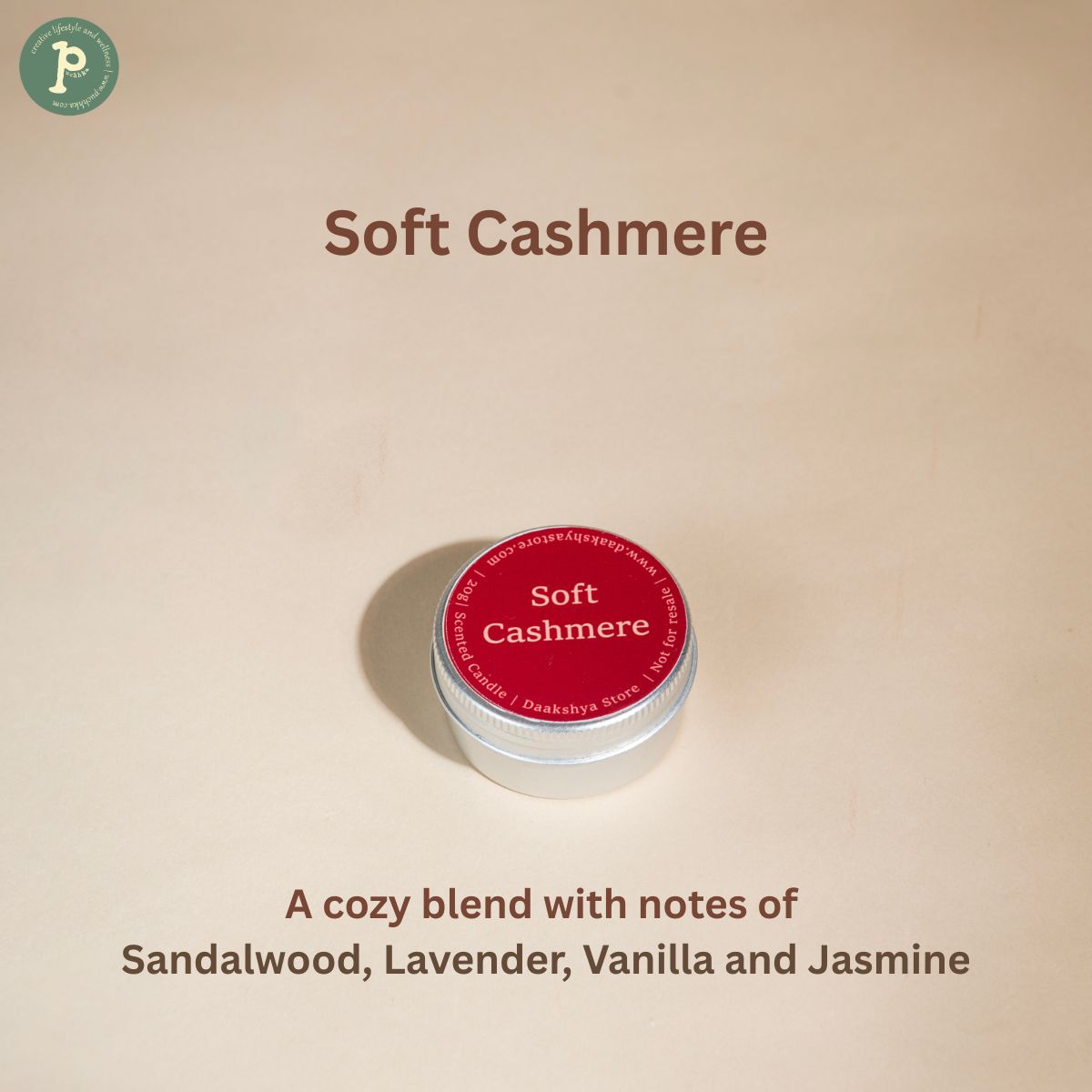 Soft Cashmere scented candle is on a beige background with notes "Sandalwood, Lavender, Vanilla and Jasmine"written at the bottom