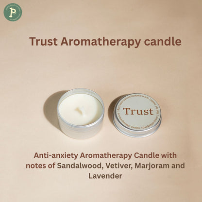 Trust mini 20g candle on a beige background with scent notes "Sandalwood, Vetiver, Marjoram and Lavender" written at the bottom.